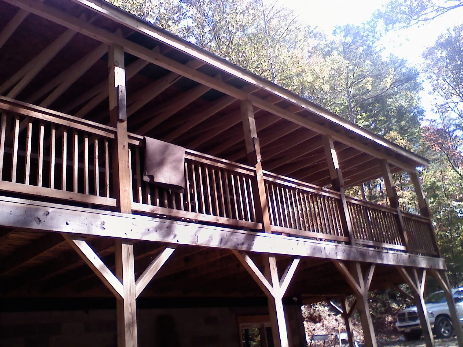 Timber framing under a new elevated porch and deck — Roof Leak Repair in Miles City by Roofing Brothers